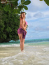Alluring blonde beauty loves frolicking in the shallow waters of a private