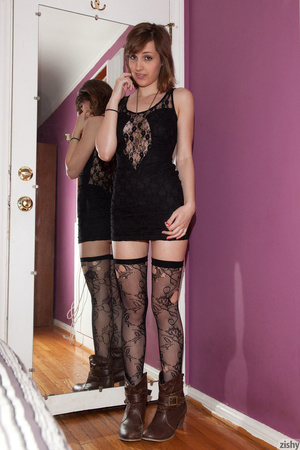 Sweet teen brunette in ripped black lace - Picture 1