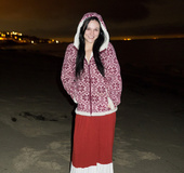 Her sweet pussy is seen when she's sitting on her bed