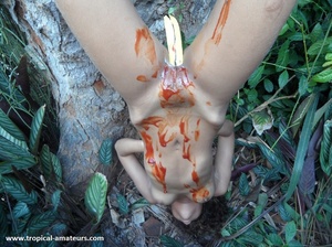 Cool tribe girl roped upside down to the tree with her body oiled with ketchup - XXXonXXX - Pic 8