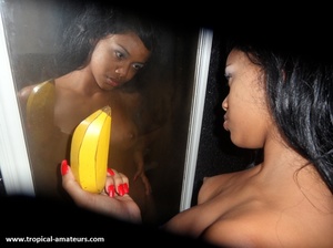 Breath-taking swarthy freshie licking wooden banana in front of the mirror - Picture 4