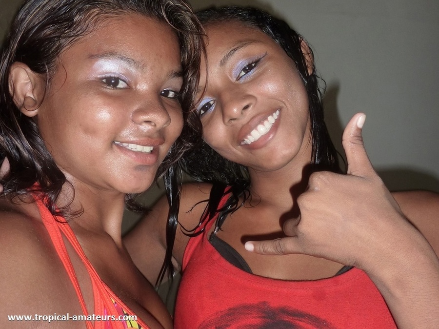 Two nasty exotic girl posing in bright bikinis kissing - XXXonXXX - Pic 1