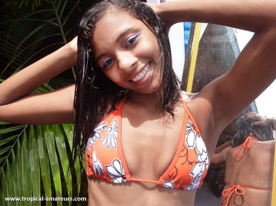 Swarthy teen babe in orange bikini looking very seductive - XXXonXXX - Pic 5