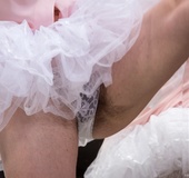 Cute hot looking lady dancer ends up nude playing with her hairy pussy