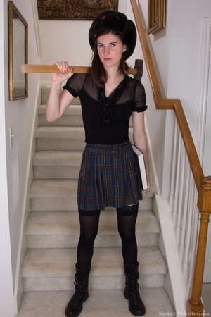 Lovable girl plays dress up with hammer  - Picture 1