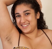 Girl in sexy stockings slowly takes them off before spreading to show