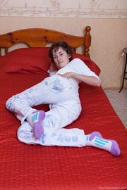 Happy hairy model is happy to spread legs to show out hairy pussy