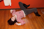 Sweet American teeny laying on the floor showing off her bottom