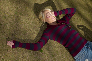 Naughty blonde girl in a striped sweater - Picture 1