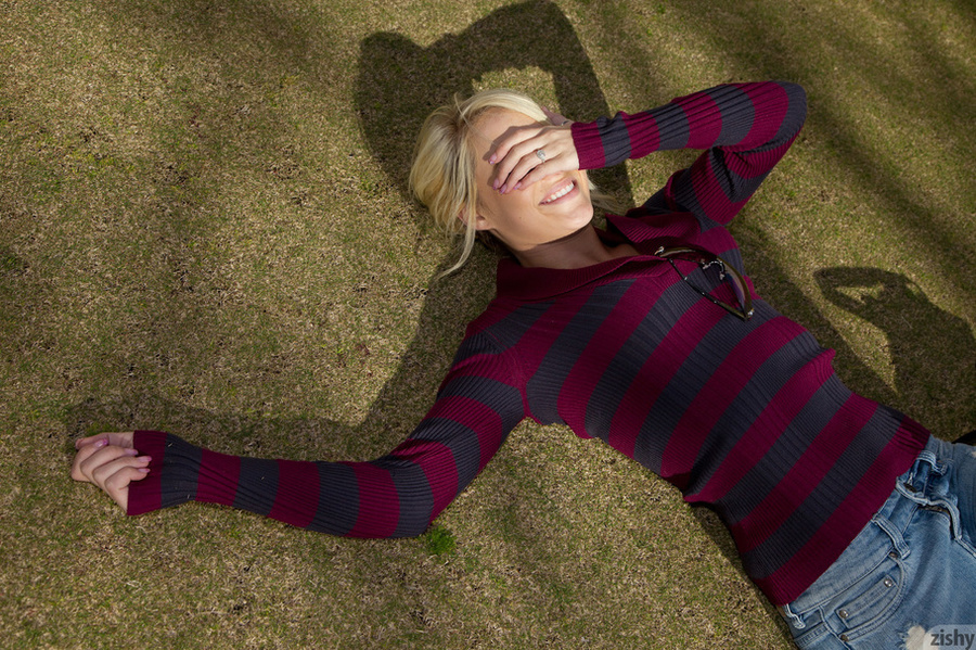 Naughty blonde girl in a striped sweater po - XXX Dessert - Picture 1