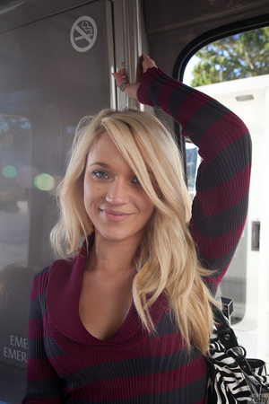 Naughty blonde girl in a striped sweater - Picture 5