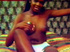 A naked vintage ebony sweetie masturbates in the sixties