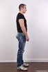 Short haired guy reveals his body