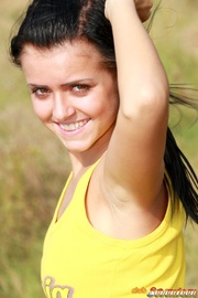 Outdoor tanning session turns on teen girl