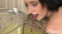 Pretty girl in net pantyhose piss on glass chair indoors and then licks