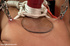 Cute chick moans with pleasure as an automated fuck machine fucks her