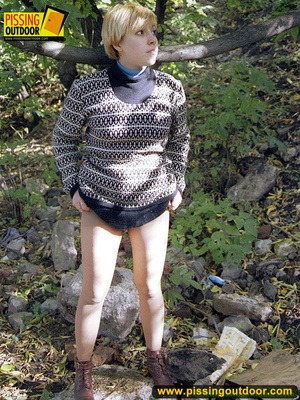 Cute short hair blonde bends down to take a piss out in the woods in early autumn - XXXonXXX - Pic 2