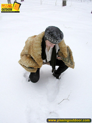 Cute white teen in fur coat, shirt and pantyhose takes an piss in the snow - Picture 5
