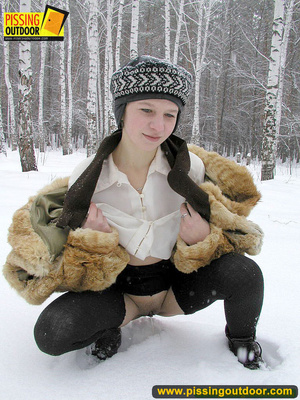 Cute white teen in fur coat, shirt and pantyhose takes an piss in the snow - Picture 10