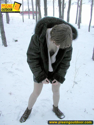 Kinky teen in glass bends to piss in the snow revealing tits and cute bushy pussy - XXXonXXX - Pic 17