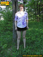 Nature lover takes off panties and raises short skirts to piss in the woods