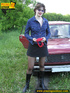 Cute sexy dressed chick stops her car to take off red panties for a leisure