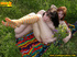 Two pretty but kinky babes get nude in the woods to piss on each other’s