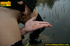 Two hot chicks on the open road piss outdoors on their hands and lick