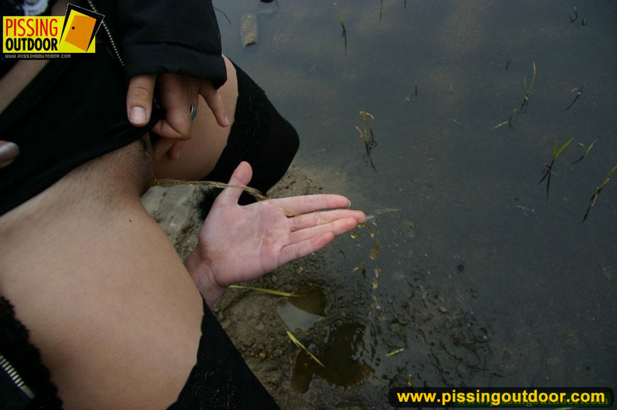 Two hot chicks on the open road piss outdoors on their hands and lick fingers - XXXonXXX - Pic 13