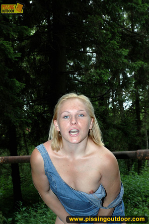 Hot blonde too kinky to take off panties as she slides pant to pee out n the woods - Picture 3