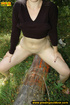 Naughty chick pisses on a tree before playing with a bottle in her cunt