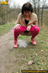 Brunette has no problem exposing her tush outdoors to take a piss in nature