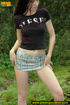 Pretty chick meets a pool and bends down to take a piss in it exposing