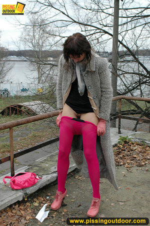 Girl in bright shows no shame as she bends to show pussy and pee right on the road - XXXonXXX - Pic 16