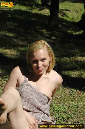 Cute blonde has fun showing tits and pussy as she opens legs to piss on park bench - XXXonXXX - Pic 4