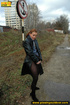 Pretty babe in black leather and stockings stop on road to piss outdoor