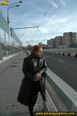 City babe cant wait to get home and bends down to piss right on the city streets - XXXonXXX - Pic 1