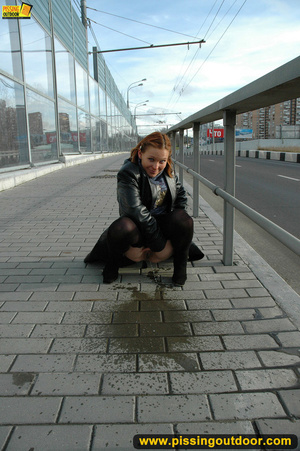 City babe cant wait to get home and bends down to piss right on the city streets - XXXonXXX - Pic 7