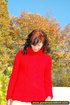 Very naughty babe in red plays with her pussy before pissing into pond