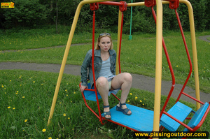 Hot young chick in public playground raise skirt and slide panty to piss on swing - XXXonXXX - Pic 2