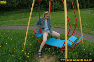 Hot young chick in public playground raise skirt and slide panty to piss on swing - XXXonXXX - Pic 13