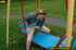 Hot young chick in public playground raise skirt and slide panty to piss