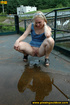 Young blonde chick with small sexy tiny tits bends to open ass and piss
