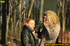 Two very sexy girlfriends taking a walk outdoors stop to piss by large