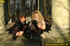 Two very sexy girlfriends taking a walk outdoors stop to piss by large