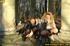 Two very sexy girlfriends taking a walk outdoors stop to piss by large