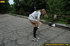 Smiling babe strips of stockings and shoes to pee hot piss on public concrete