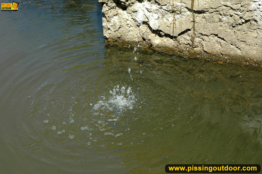 Hot blonde on nature stroll takes hot piss on stone ledge to river below - XXXonXXX - Pic 6