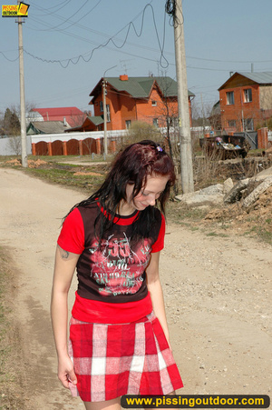 Hot girl in red raises short red skirt to piss hot piss on public road - XXXonXXX - Pic 5