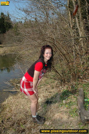 Young girl in sexy red dress in woods expose butt and spreads legs to piss - XXXonXXX - Pic 1